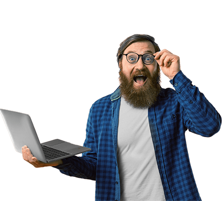 A beared man looks with amazement at the internet offer on his laptop.